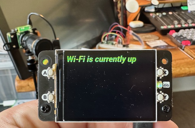 Display showing "Wi-Fi is currently up" in green text